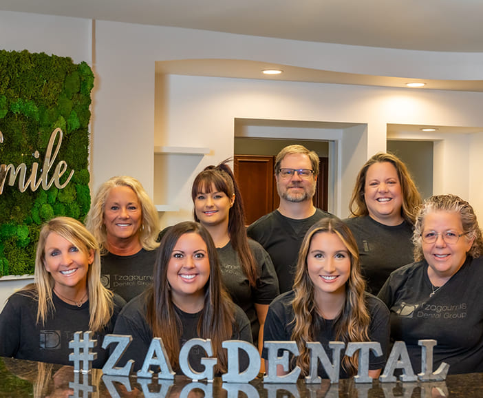 Smiling blonde woman in dental chair at Westerville dental office