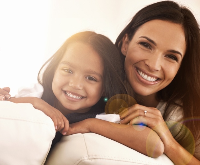 Mother and daughter smiling after seeing childrens dentist in Westerville