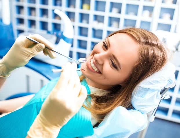 Woman smiling in dental chair